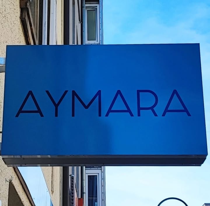 AYMARA Ladenschild in der Sedanstraße